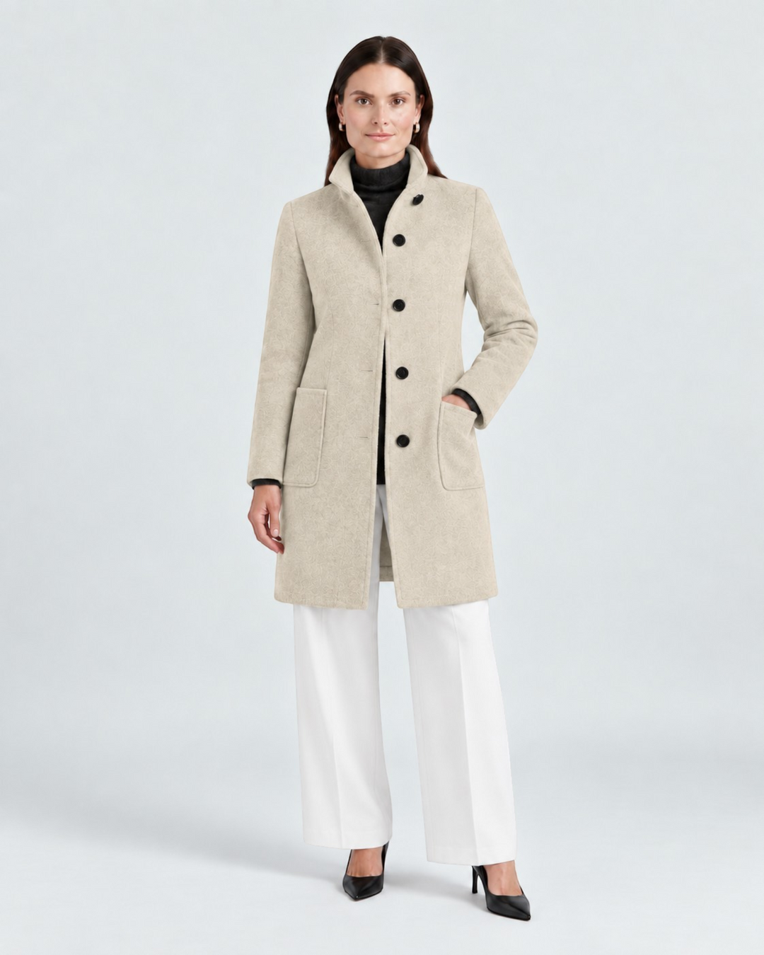 Luna Moda NELLA beige high-neck wool-blend coat worn by a model with white trousers and black heels