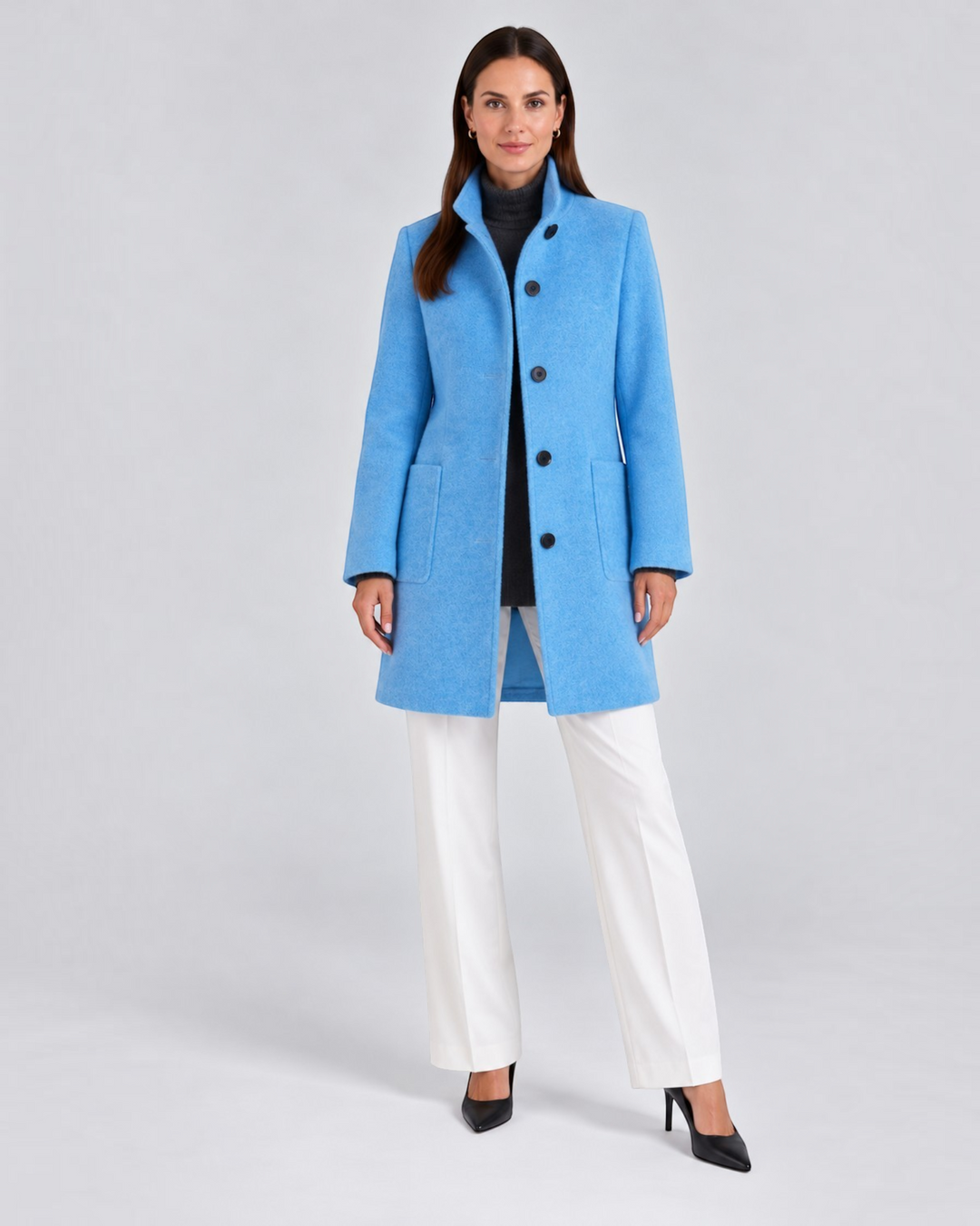 Luna Moda NELLA bright blue high-neck wool-blend coat worn by a model with white trousers and black heels