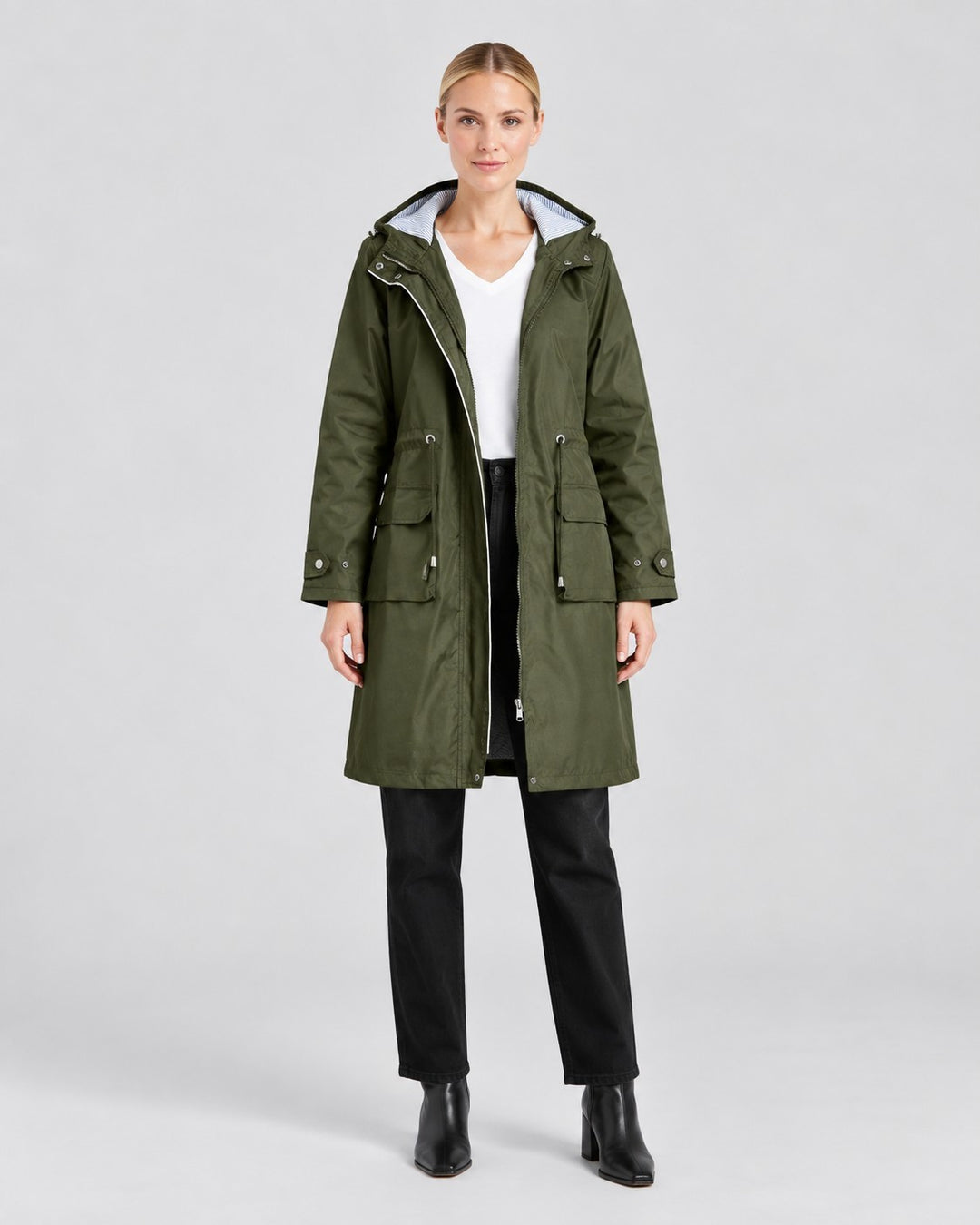 Luna Moda olive green lightweight hooded trench coat with front pockets and adjustable waist on a female model