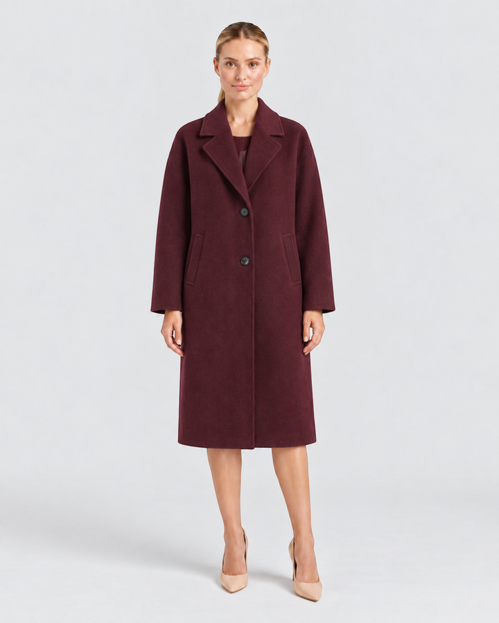 Luna Moda Diana long burgundy wool-blend coat with a relaxed oversize fit and button closure worn by a model