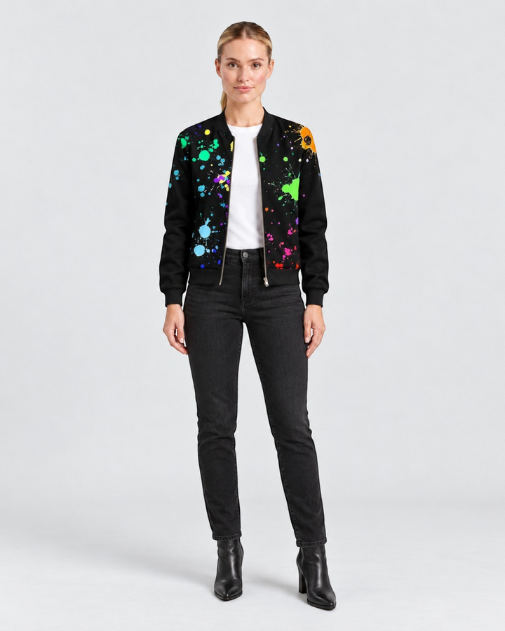 Luna Moda Sofia bomber jacket in black with a vibrant multi-colored paint splatter botanical print on a model.