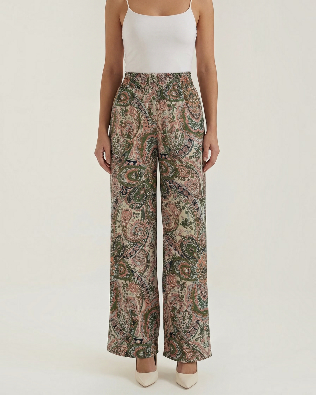 Luna Moda Melania wide-leg trousers featuring a vibrant bohemian paisley print in soft green and pink tones.