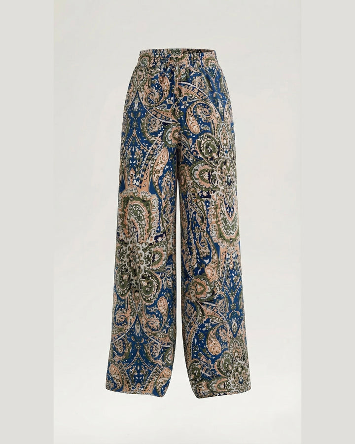 Luna Moda Melania wide-leg trousers featuring a vibrant blue and green paisley print in lightweight fabric.