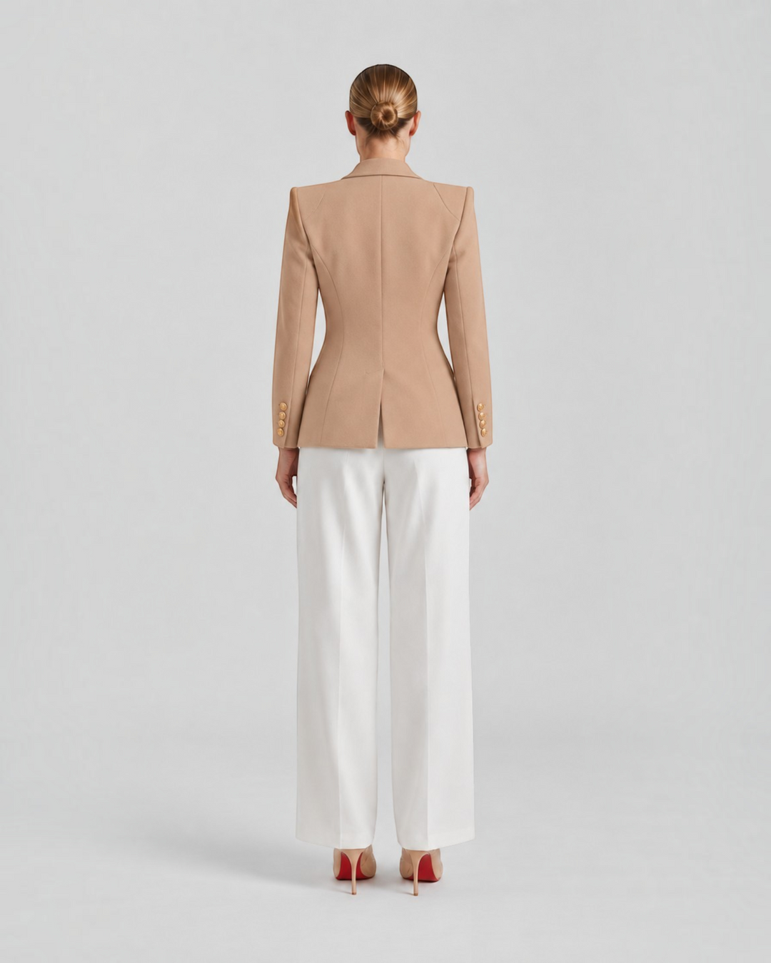 Luna Moda Paolina beige structured blazer with gold buttons worn with white trousers, back view
