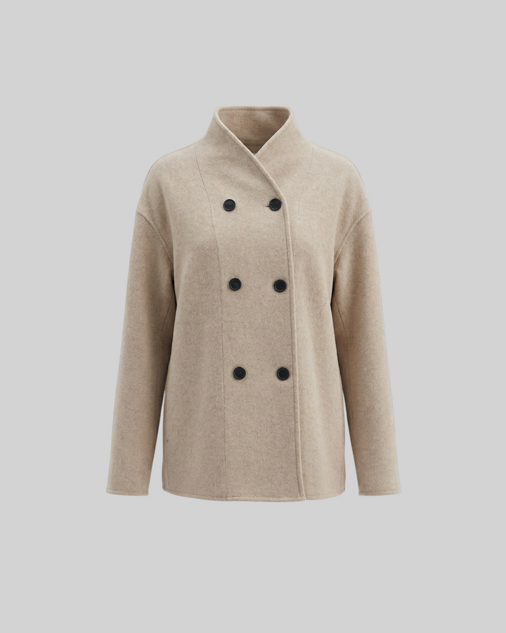 Luna Moda Patrizia beige oversized jacket with double-breasted black buttons and a soft textured finish.