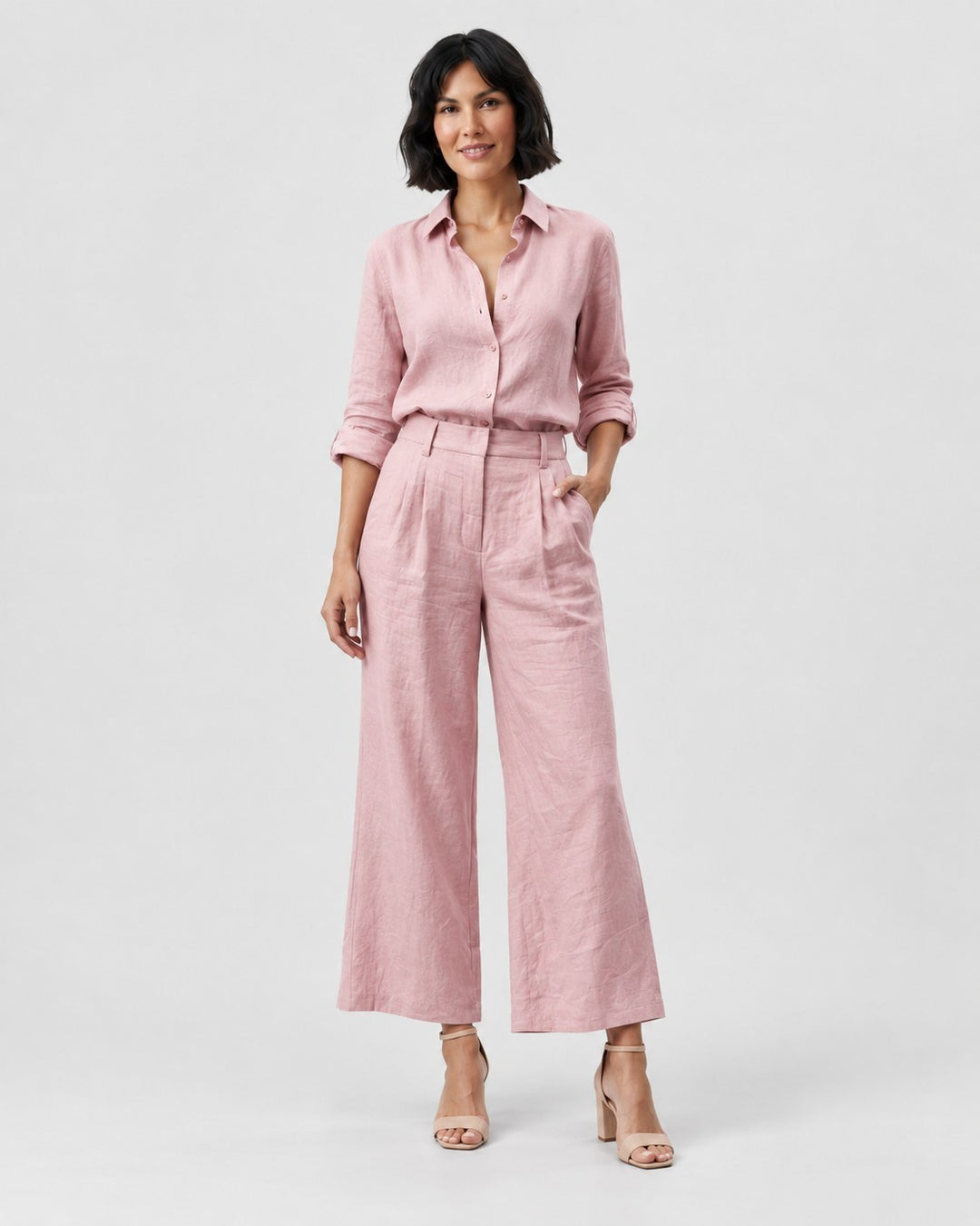 Luna Moda pink linen-blend casual chic set featuring a loose button-down shirt and wide-leg capri trousers on a model
