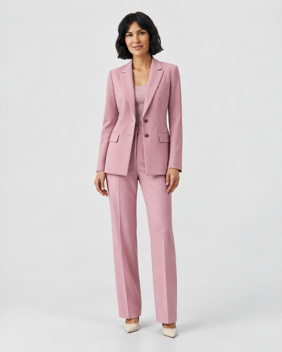 Luna Moda Olivia pink structured blazer and tailored trouser suit worn by a woman on a neutral background
