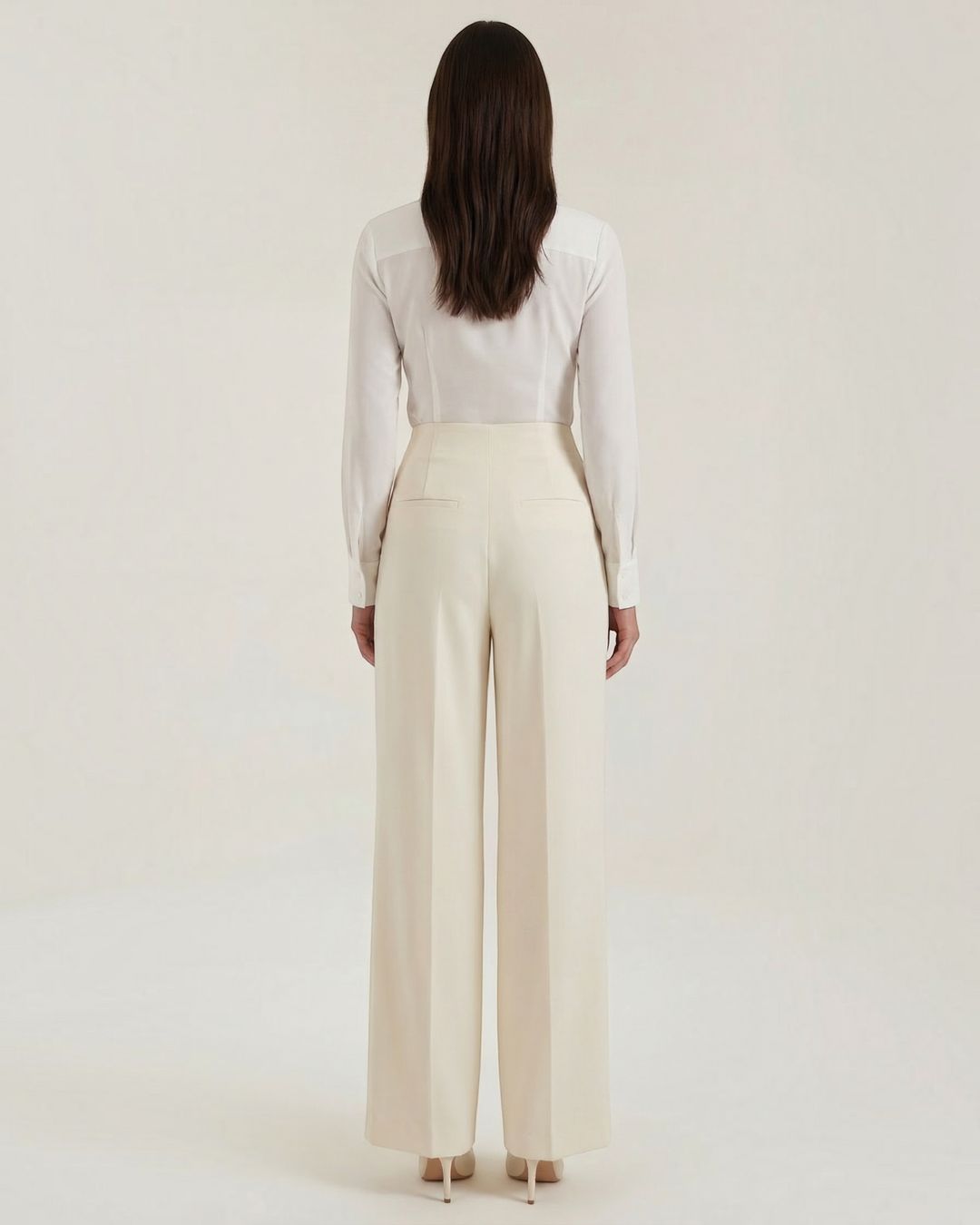 Luna Moda ivory crepe palazzo trousers with a high-waisted tailored fit, shown from the back on a model.