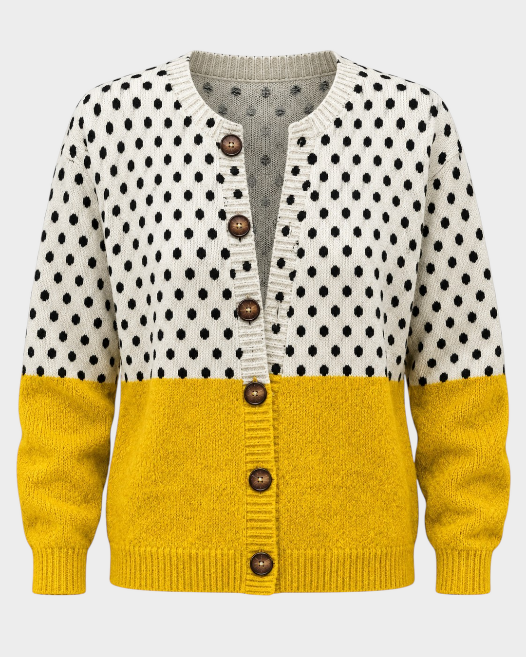 Luna Moda Angelica knit cardigan with cream polka dot top, mustard yellow bottom, and wooden buttons.