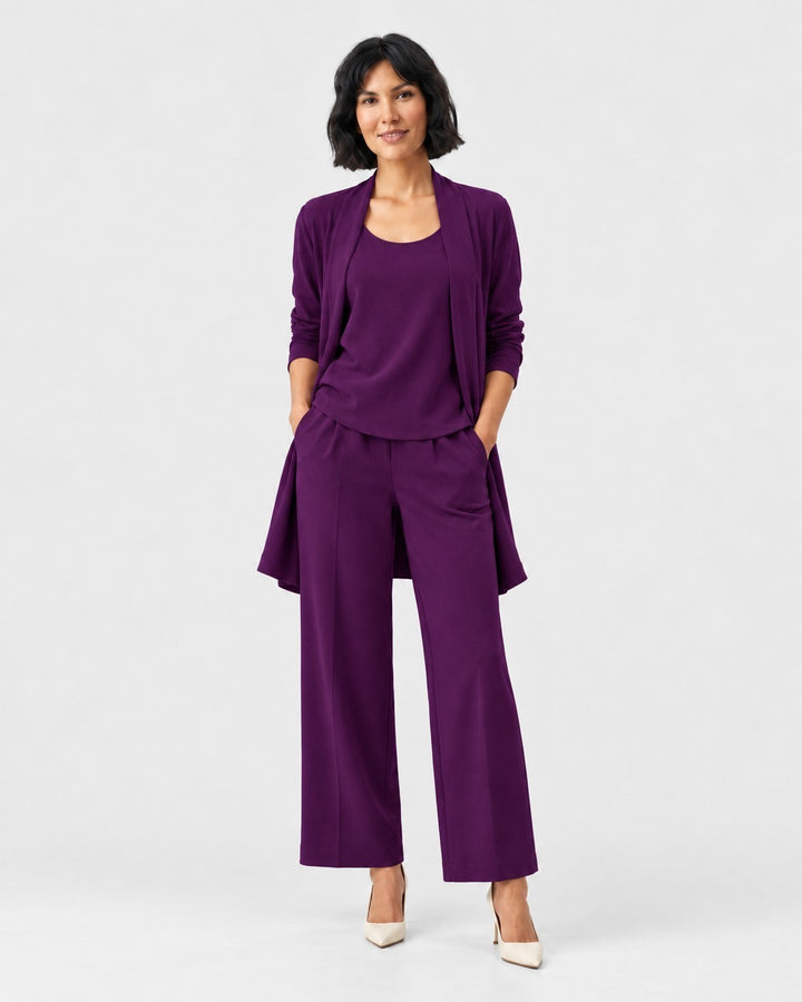 Luna Moda three-piece purple set featuring a sleeveless top, open cardigan, and wide-leg trousers on a model.