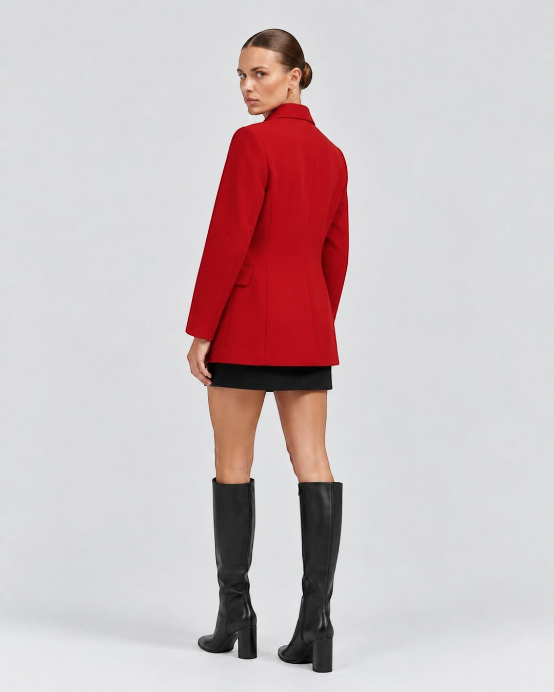Luna Moda red classic blazer worn with a black skirt and knee-high boots, back view on a model