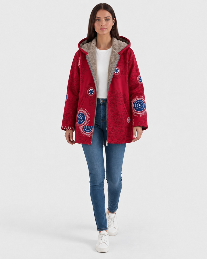 Luna Moda red hooded jacket with geometric patterns and soft sherpa lining worn by a woman with jeans