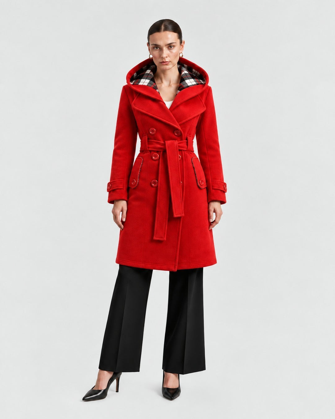 Luna Moda red hooded winter coat with a belted waist, double-breasted buttons, and plaid lining on a model.