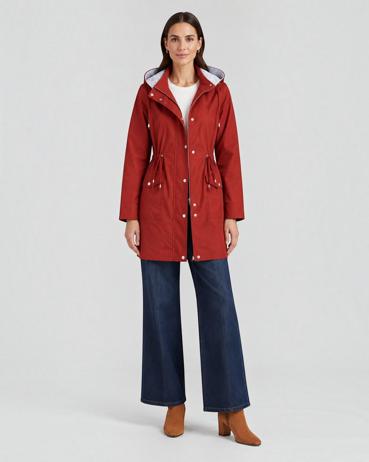 Luna Moda Olimpia red lightweight hooded jacket with adjustable waist and striped lining worn by a female model