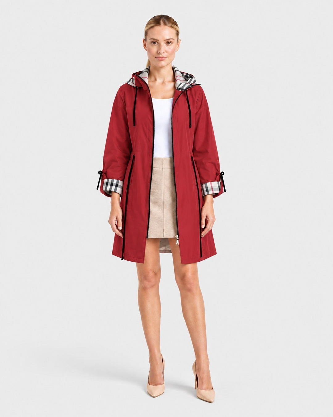 Luna Moda red lightweight windbreaker jacket with a hooded plaid lining and adjustable cuffs worn by a woman