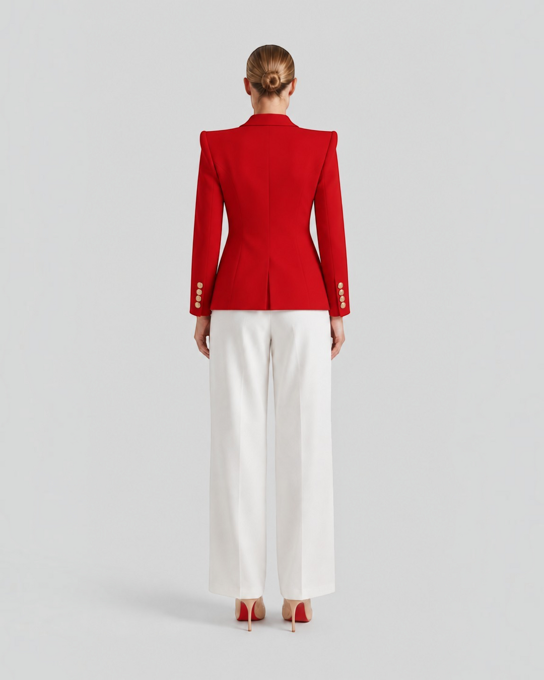 Luna Moda Paolina red structured blazer with gold decorative buttons worn with white trousers, back view