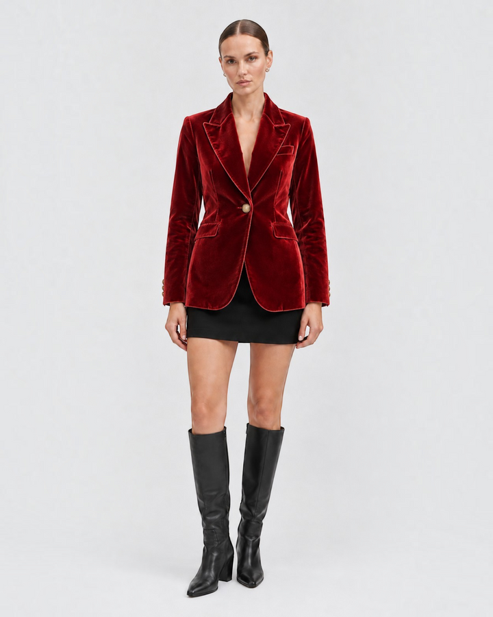 Luna Moda red velvet tailored blazer worn by a model with a black mini skirt and knee-high boots