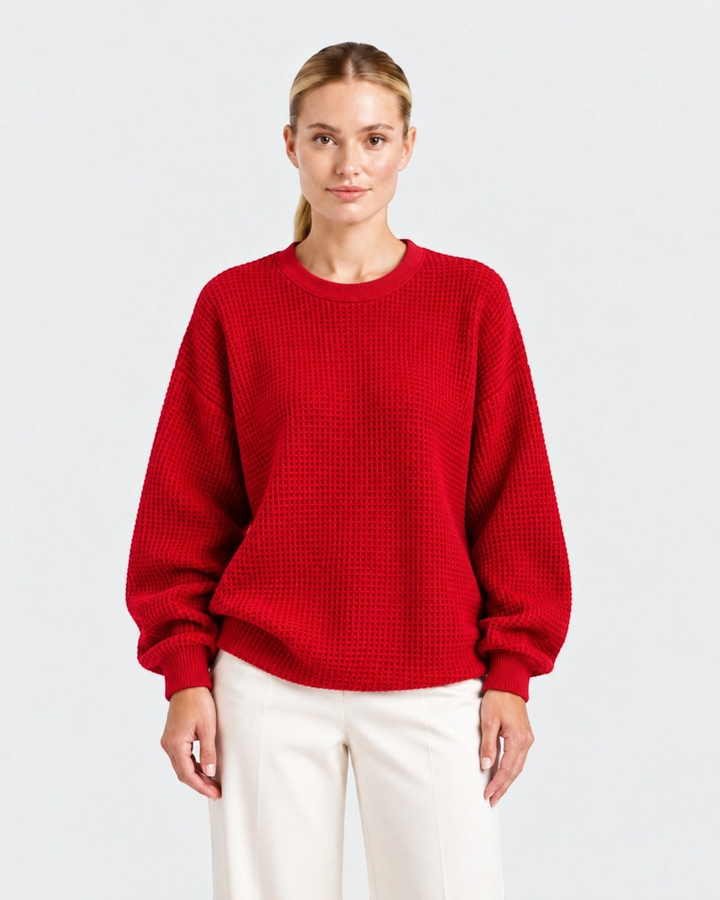 Luna Moda Lucia red waffle knit oversized sweater with a crew neck worn by a model against a white background.
