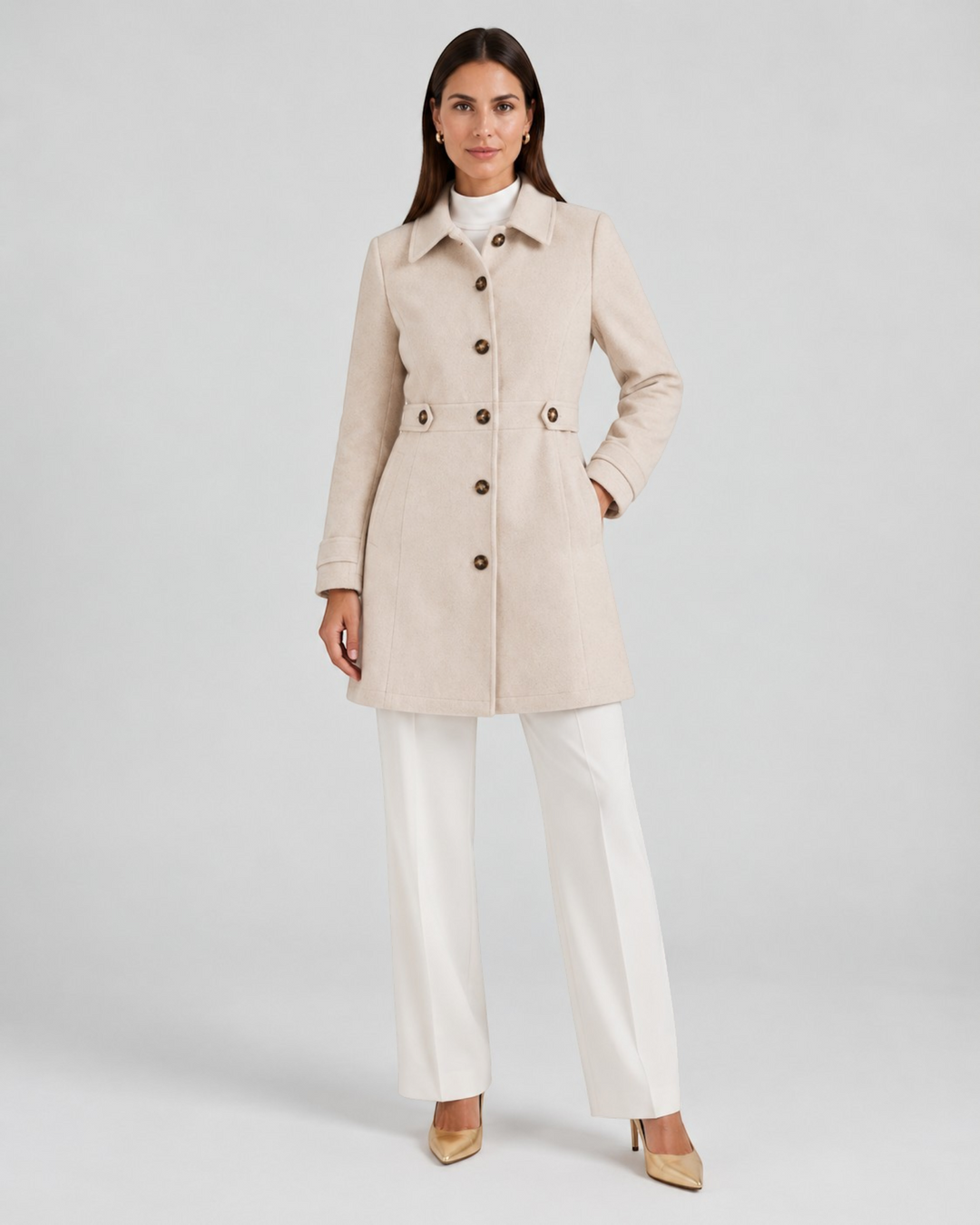 Luna Moda Rosalinda beige wool-blend short coat with button closure worn by a model with white trousers