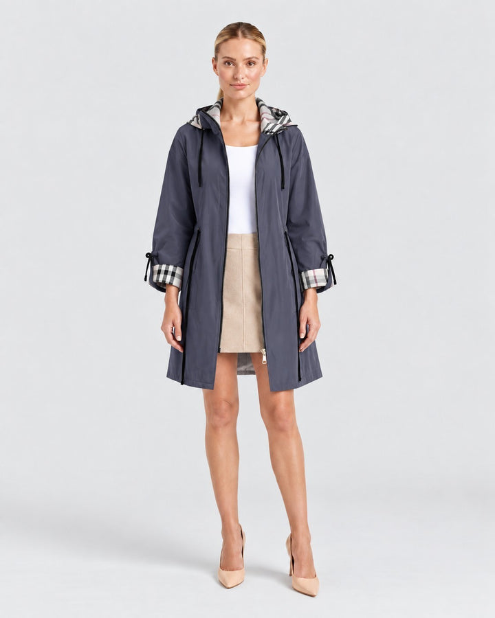 Luna Moda Rosmunda lightweight windbreaker jacket in grey with plaid hood and cuff lining worn by a model