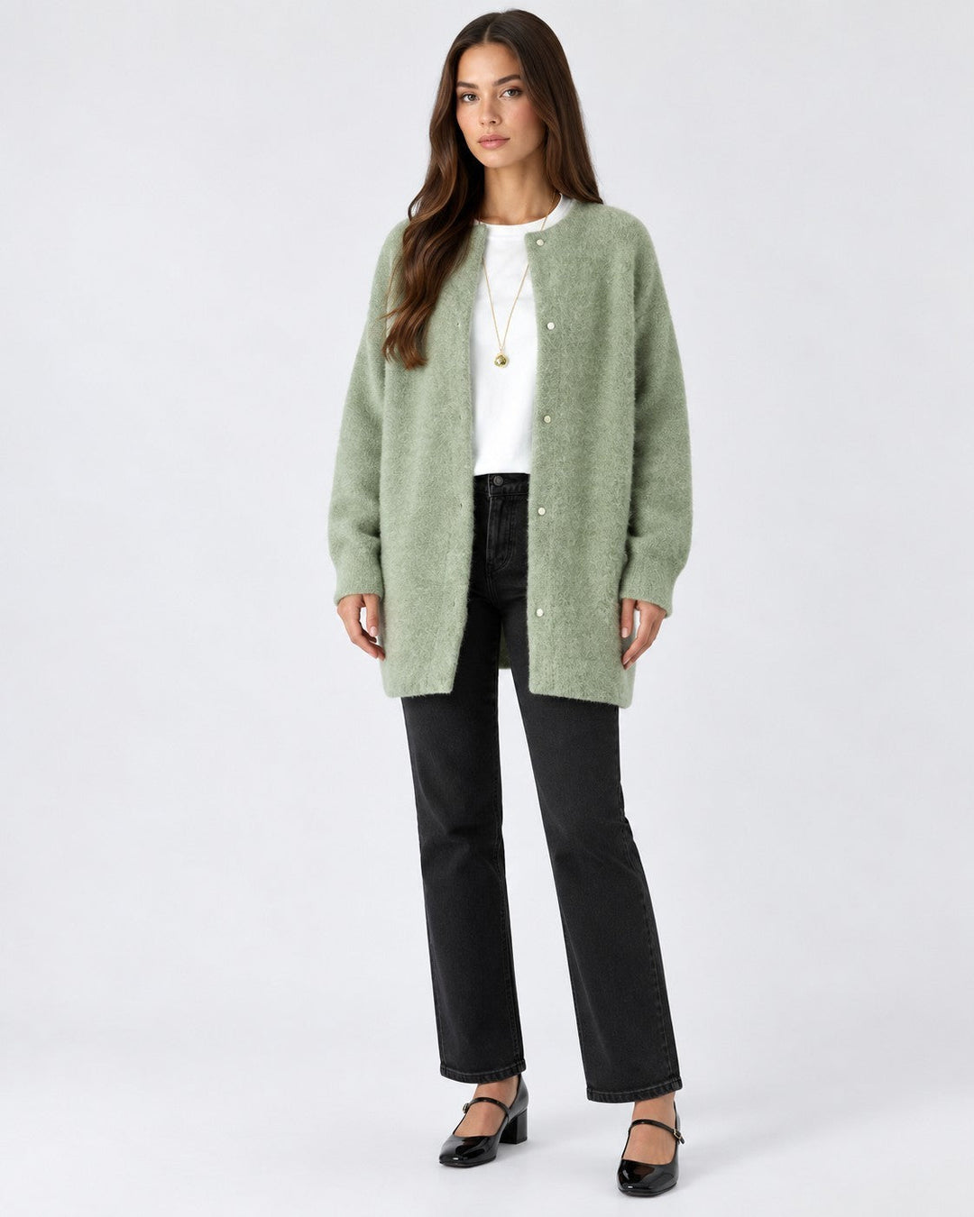 Luna Moda sage green soft knit long cardigan worn by a model with black jeans and a white top