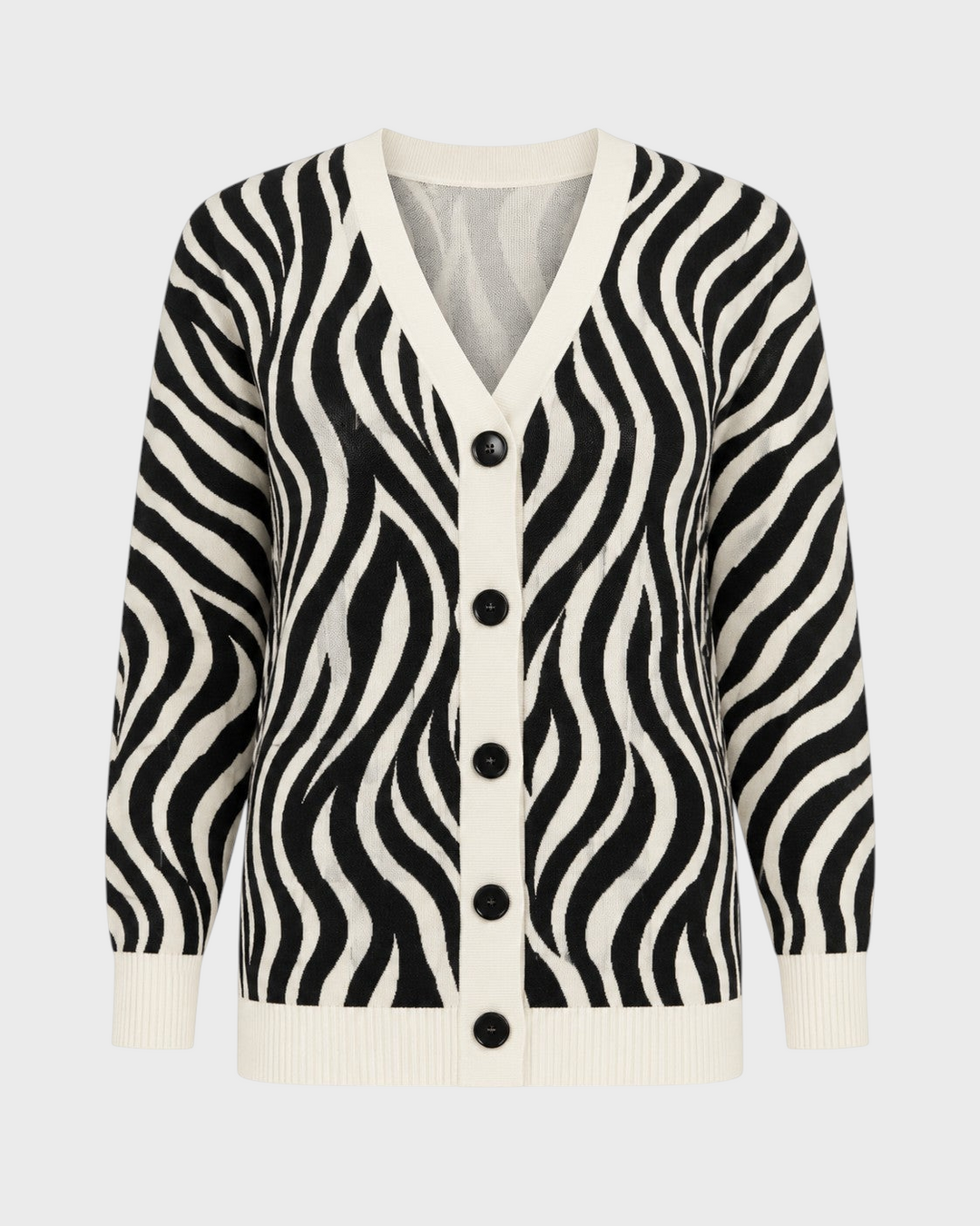 Luna Moda Serena cardigan featuring a black and white zebra animal print, V-neck, and front button closure.