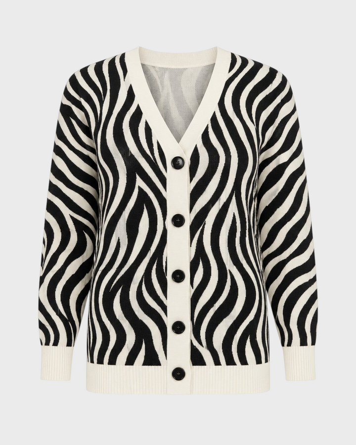 Luna Moda Serena cardigan featuring a black and white zebra animal print, V-neck, and front button closure.