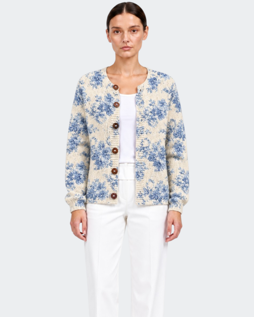 Luna Moda Simona cardigan with blue vintage floral print on cream knit fabric and tortoise shell buttons