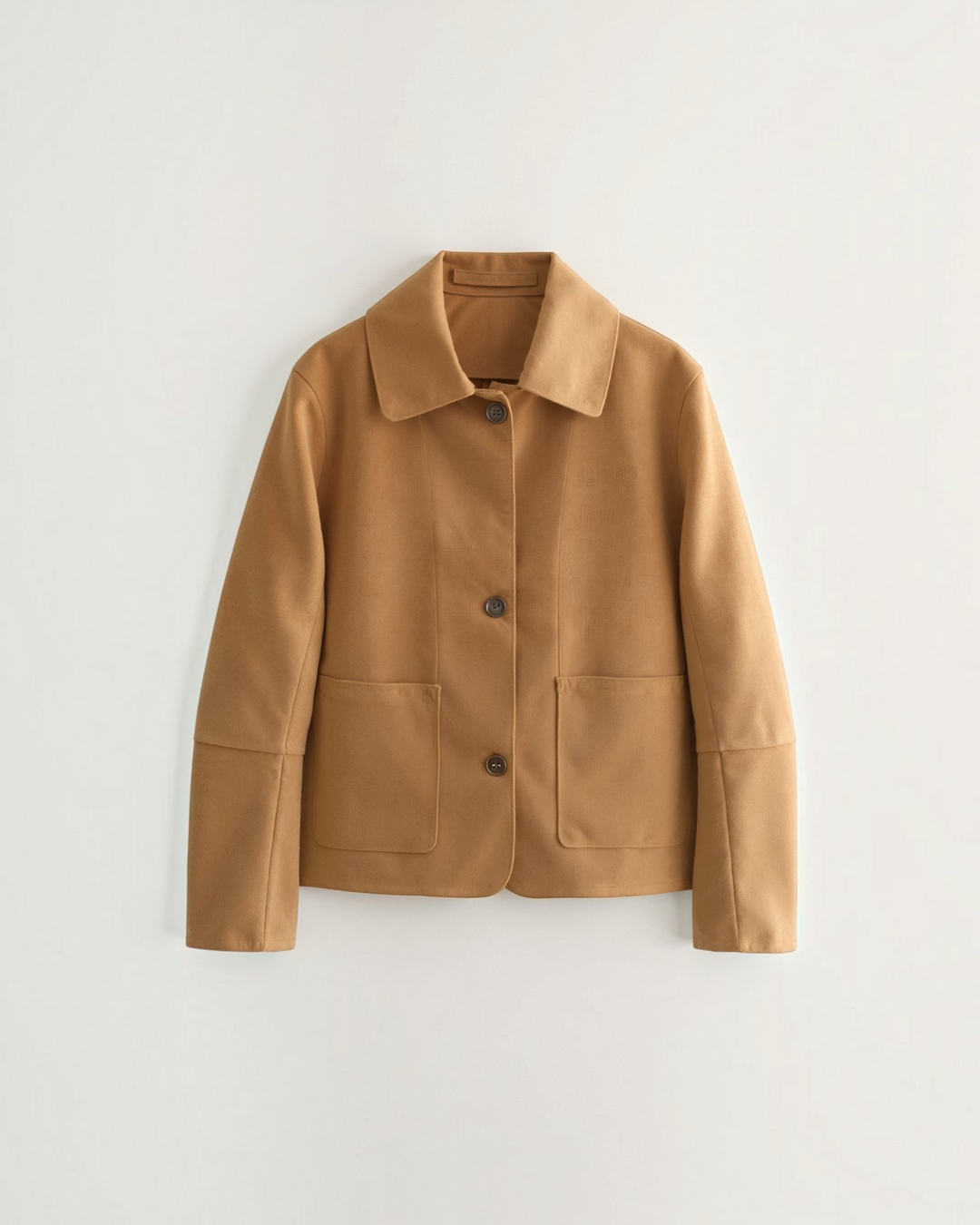 Luna Moda Julie tan short jacket with a classic collar, button front closure, and two front patch pockets.