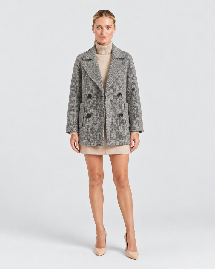 Luna Moda Daniela grey herringbone double-breasted short coat with wide lapels worn by a model
