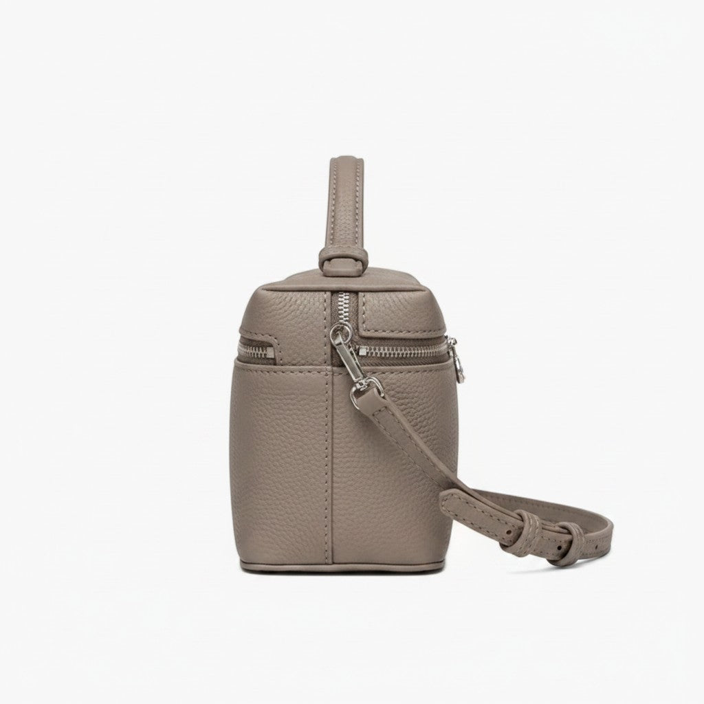 Luna Moda structured taupe leather handbag with silver hardware, top handle, and adjustable shoulder strap side view