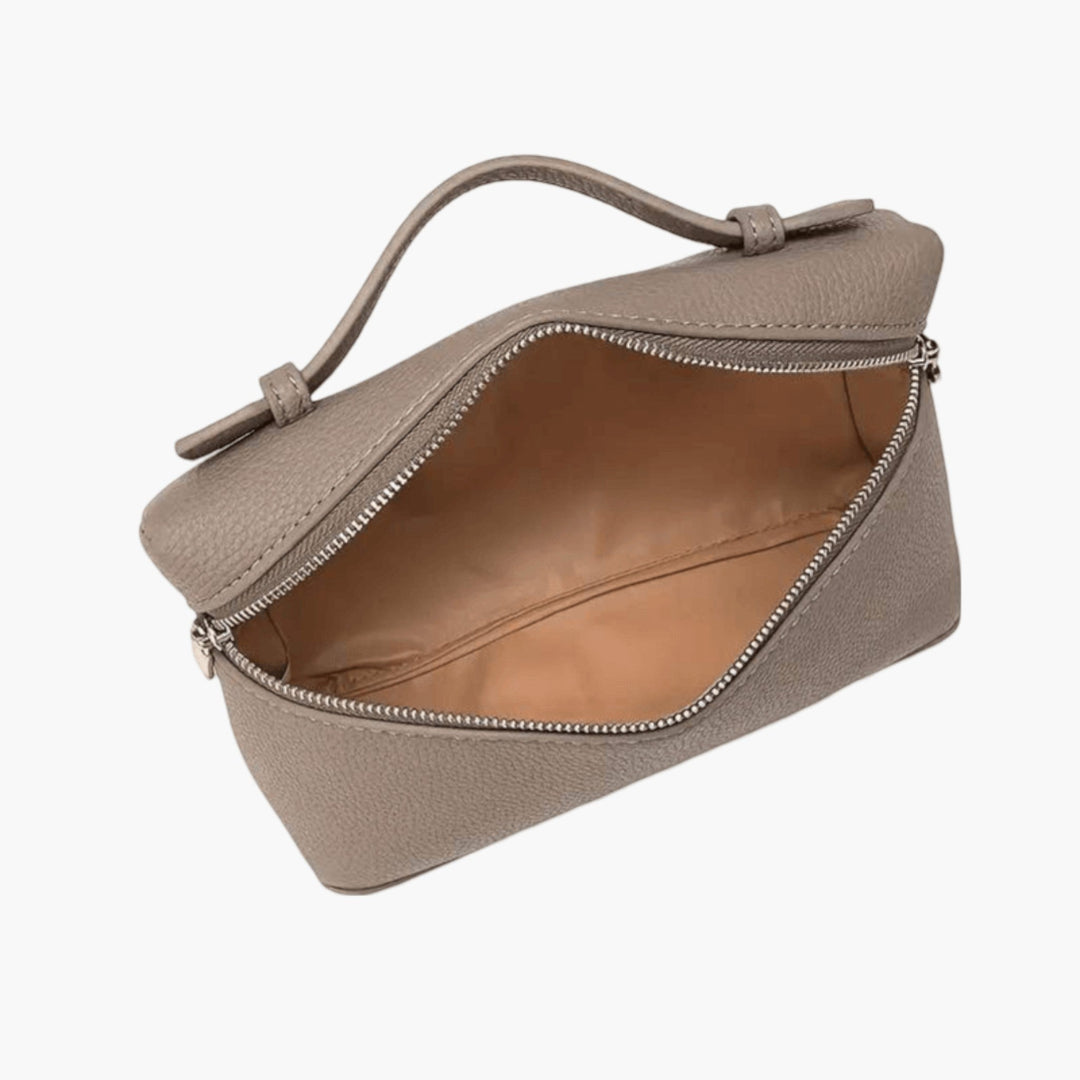 Luna Moda taupe structured handbag with a top handle, silver zipper closure, and textured leather finish.