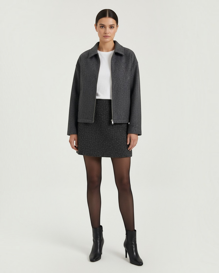 Luna Moda Teresa charcoal grey zip-up jacket with a relaxed fit, classic collar, and functional pockets on a model.