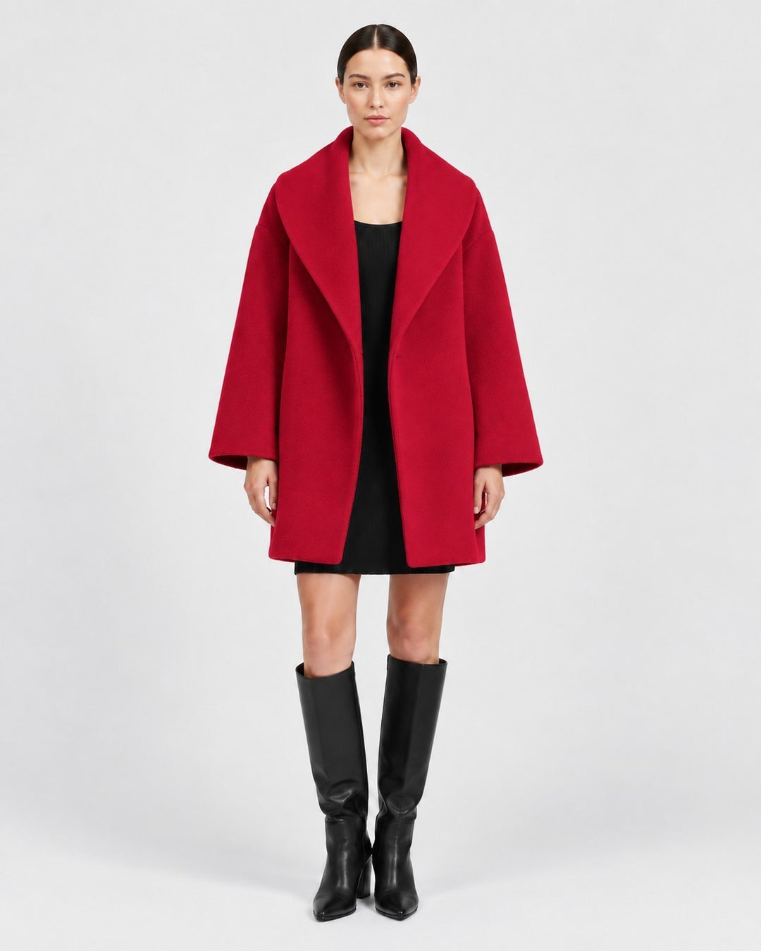 Luna Moda Veronika red wool coat with wide collar worn by a model over a black dress and knee-high boots