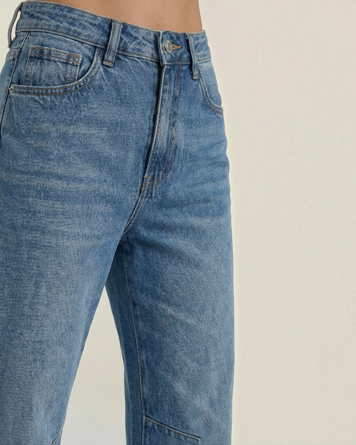 Luna Moda high-waisted barrel leg jeans in a vintage blue wash with a relaxed fit and classic denim texture.