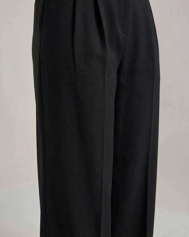 Luna Moda black high-waisted palazzo trousers with a fluid, wide-leg silhouette and tailored pleat detail.