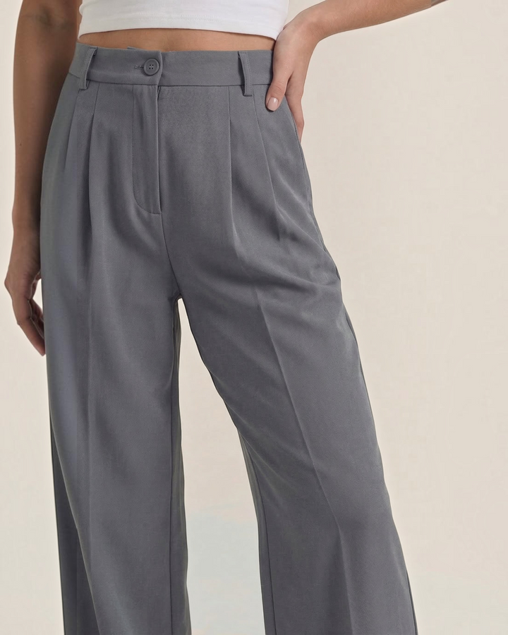 Luna Moda high-waisted grey palazzo trousers with a tailored pleated front and wide-leg silhouette.