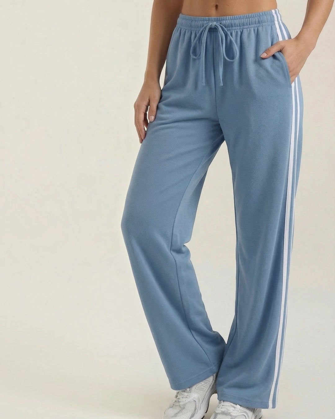 Luna Moda wide-leg blue athletic pants with white side stripes and an adjustable drawstring waist for a relaxed fit.