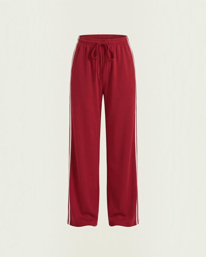 Luna Moda red wide-leg sweatpants featuring white side stripes and an adjustable drawstring waist for a relaxed fit.