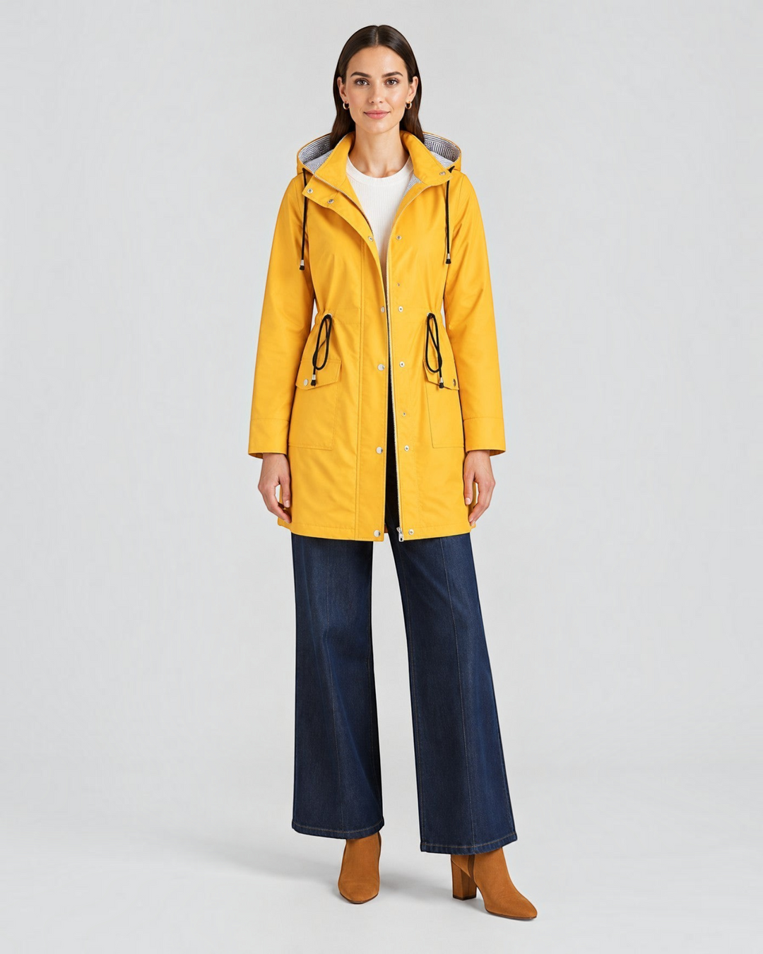 Luna Moda yellow lightweight hooded jacket with adjustable waist and patterned lining worn by a model