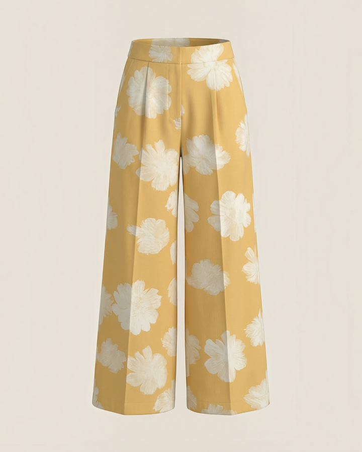 Luna Moda wide-leg lounge pants in yellow with a white floral print, featuring a relaxed fit and soft fabric.