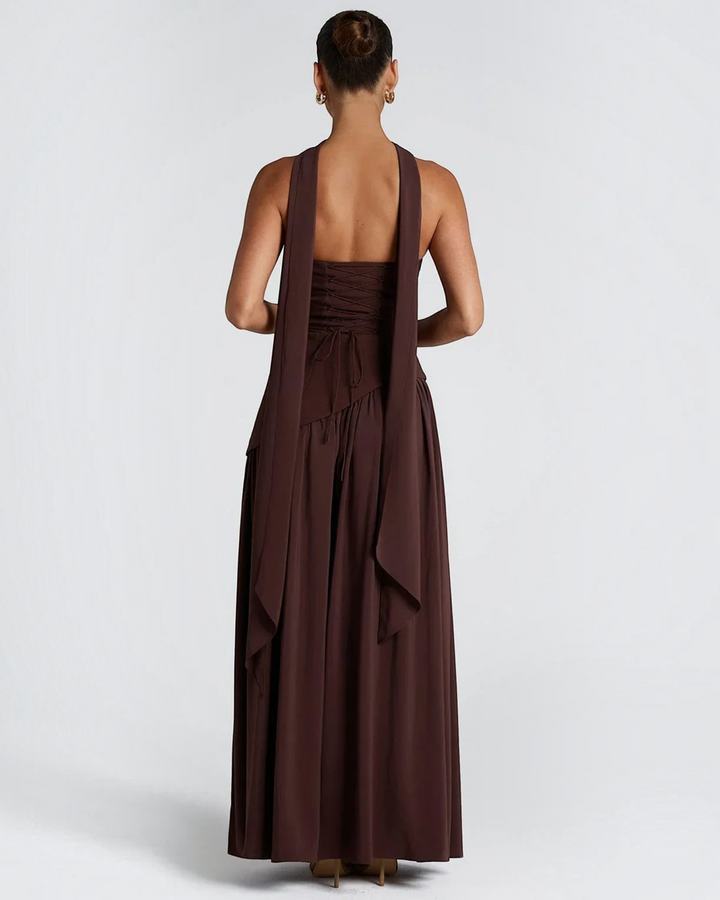 Luna Moda Zadie maxi dress in dark brown with a deep halter neckline, open back, and corset-style lace-up detail.