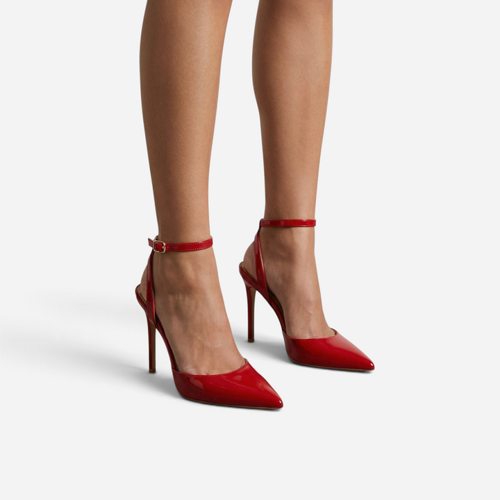 Luna Moda ASHLEY red metallic pointed-toe stiletto heels with ankle strap worn on feet