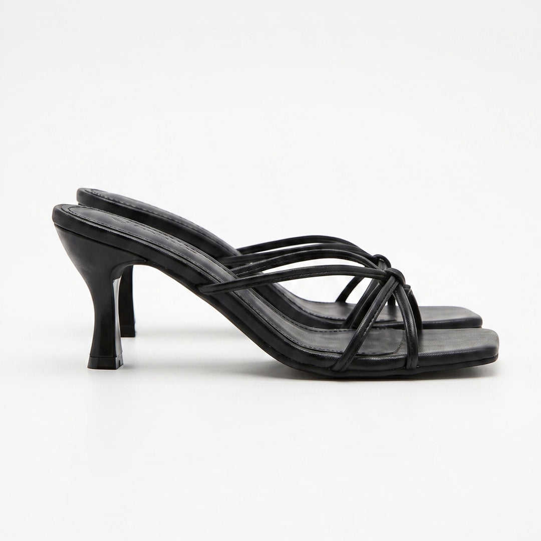 Luna Moda Christina black mule sandals with knotted straps, square toe, and 5 cm heel on a white background