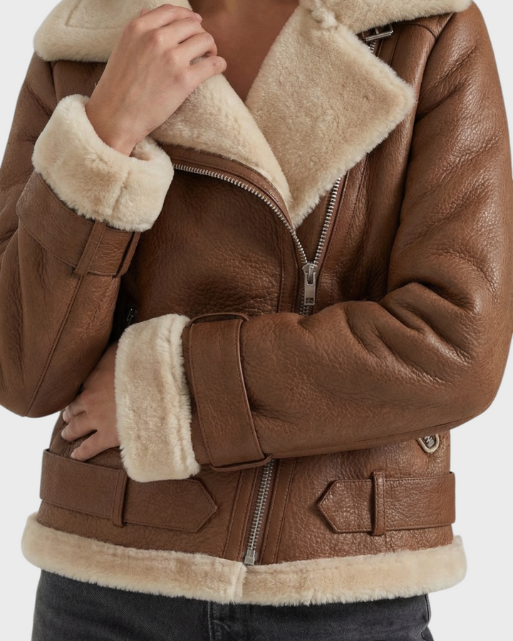 Luna Moda Claudia brown faux leather jacket with cream fleece lining, zip closure, and waist belt.