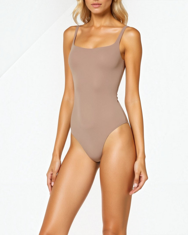 Luna Moda chocolate brown sculpting thong bodysuit with a square neckline and high-cut leg on a blonde model
