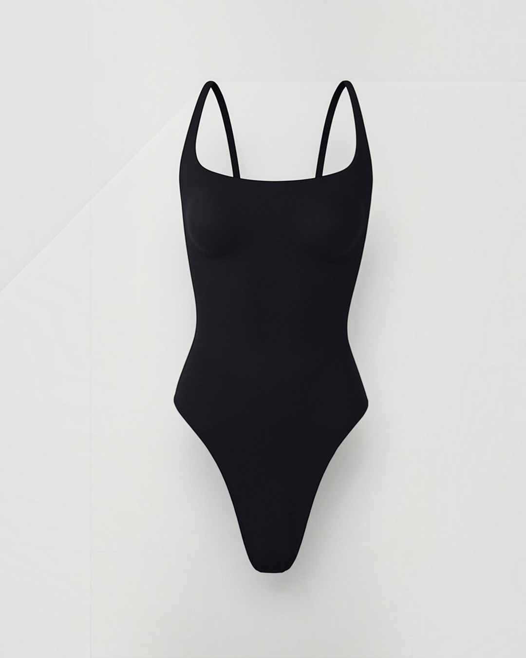Luna Moda chocolate brown sculpting thong bodysuit with a square neckline and high-cut leg for a smooth silhouette.