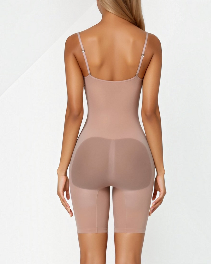 Luna Moda seamless beige thigh-length sculpting bodysuit with adjustable straps, back view on a model.
