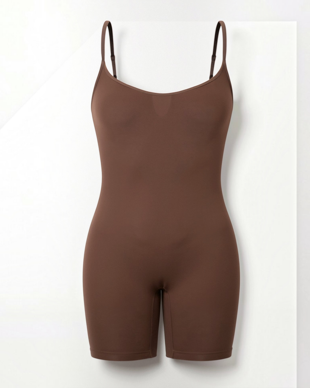 Luna Moda seamless brown sculpting bodysuit with adjustable thin straps and thigh-length compression design.