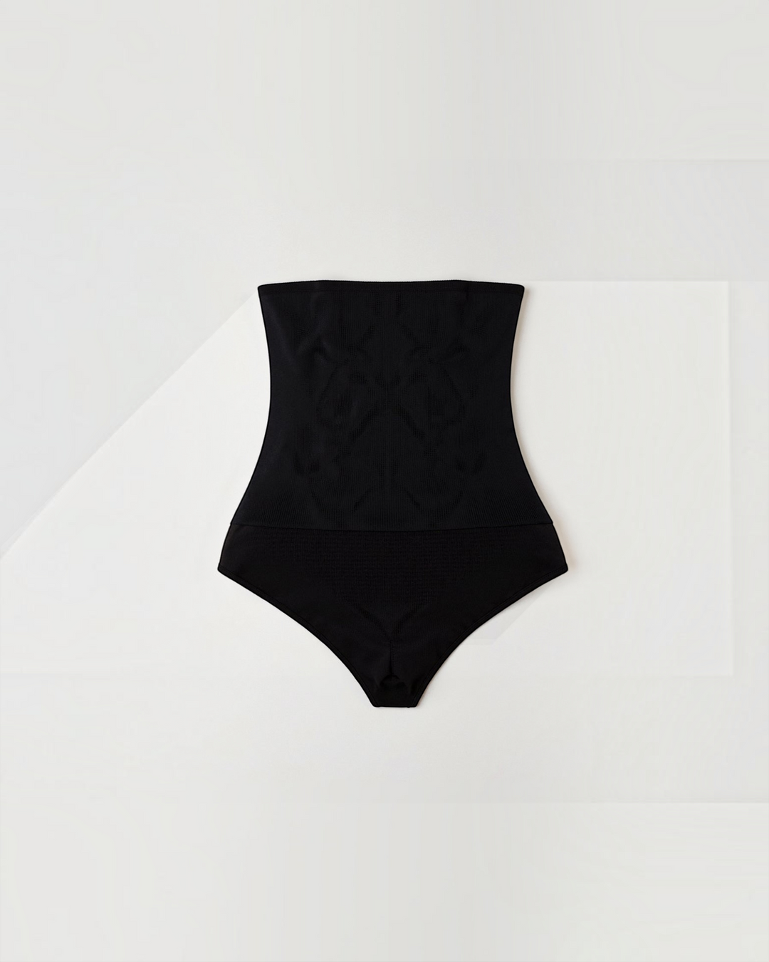 Luna Moda black high-waisted seamless shaping thong with firm compression for a smooth silhouette.